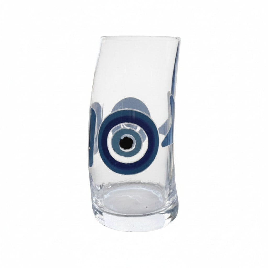 Mati Made clear glass tumbler with a curved silhouette and a blue and black evil eye motif, 520ml capacity.
