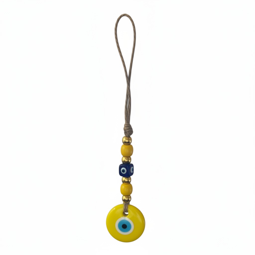 Mati Made decorative evil eye wall hanging with yellow nazar bead, gold accents, and rustic jute hanging cord