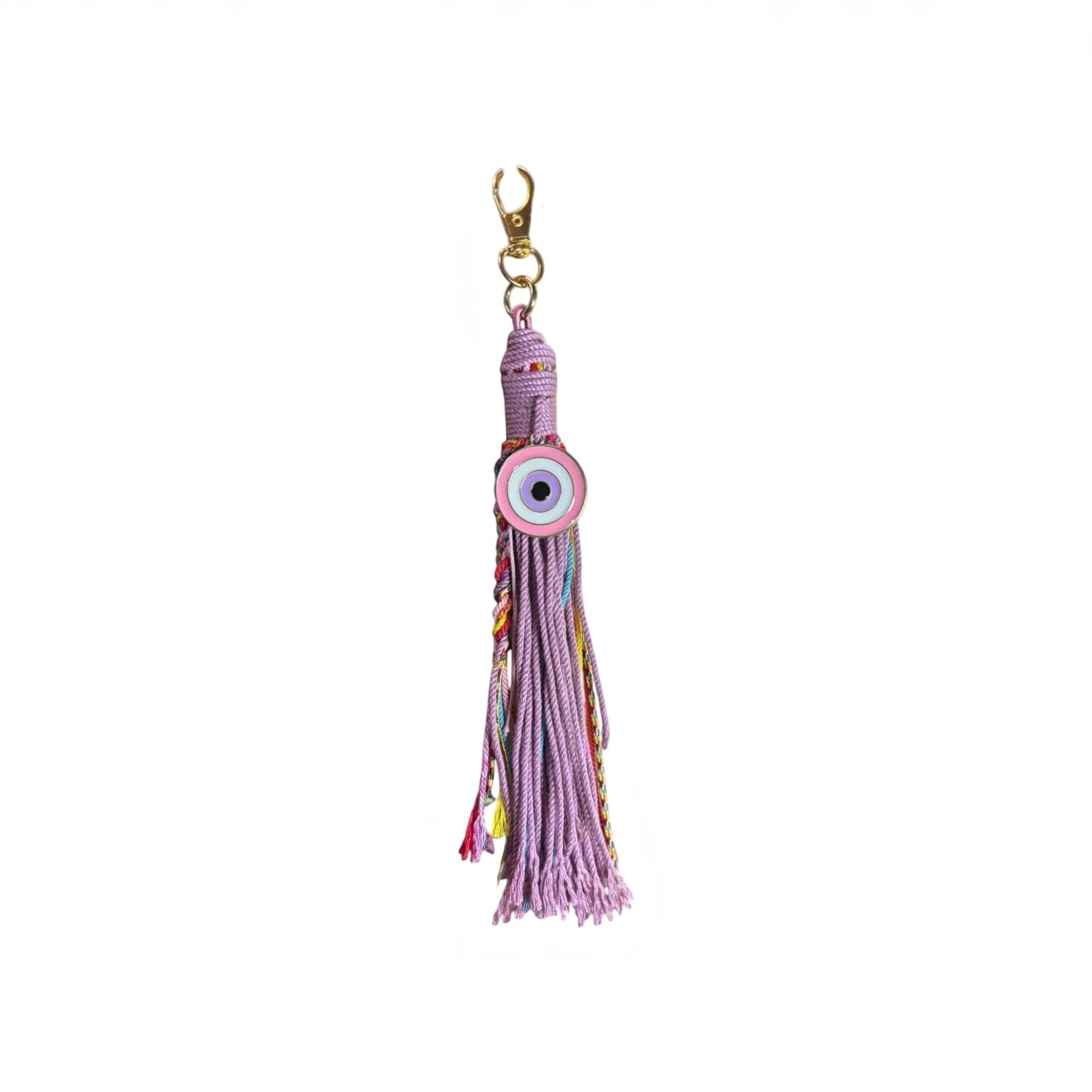 Mati Made lavender cord tassel bag charm featuring a central evil eye emblem and gold-tone lobster clasp
